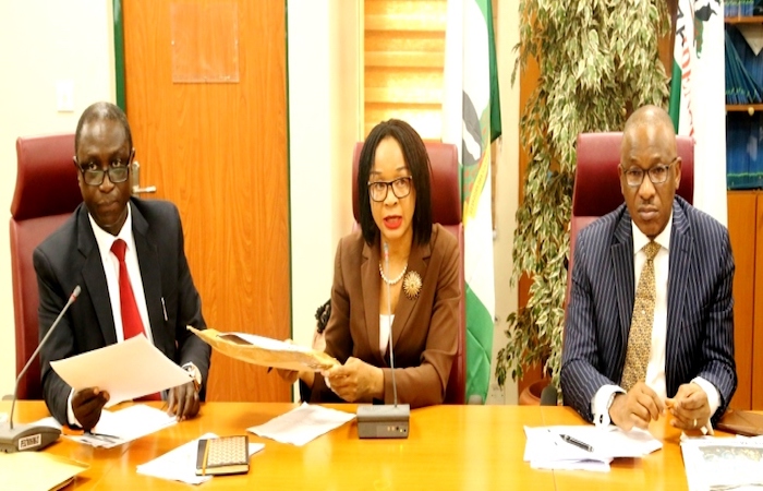 L-R: Yunana Malo, Director, Post-Privatisation Monitoring at the Bureau of Public Enterprises (BPE); Imeh Okon, Senior Special Assistant (SSA) to the President on Infrastructure, who represented the Chairman of the Technical Committee of the National Council on Privatisation; and Alex A. Okoh, Director General, BPE at the financial bids opening for five subsidiaries of Nigerian Mining Corporation and technical consultancy for power sector monitoring which held in BPE on Tuesday, October 24, 2017.