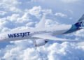 WestJet increases checked bag fees amid rising fuel costs