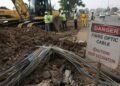 Please construct a realistic image from this headline "5,000 fibre cuts put Nigeria’s digital connectivity on construction frontline 